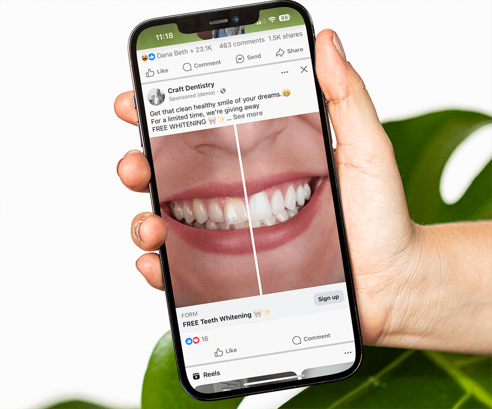 mockup-of-a-hand-holding-an-iphone-12-pro-max-in-front-of-a-plant-m21863