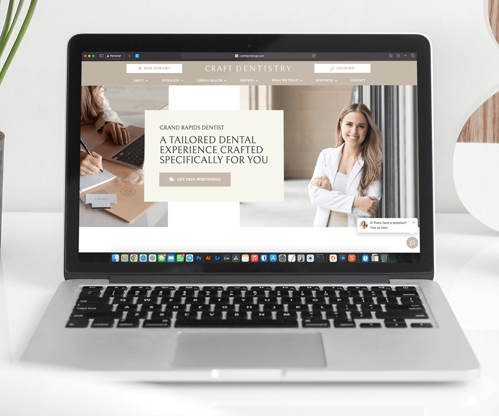 mockup-of-a-macbook-pro-placed-on-a-white-work-desk-and-next-to-a-plant-pot-484-el